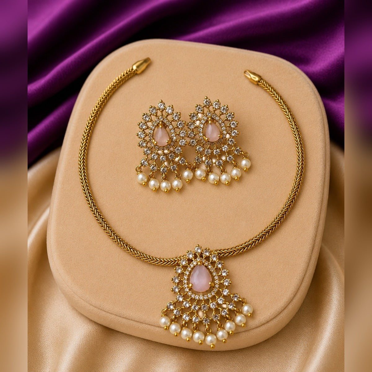 Pink teardrop halo necklace and earring set with pearl drops