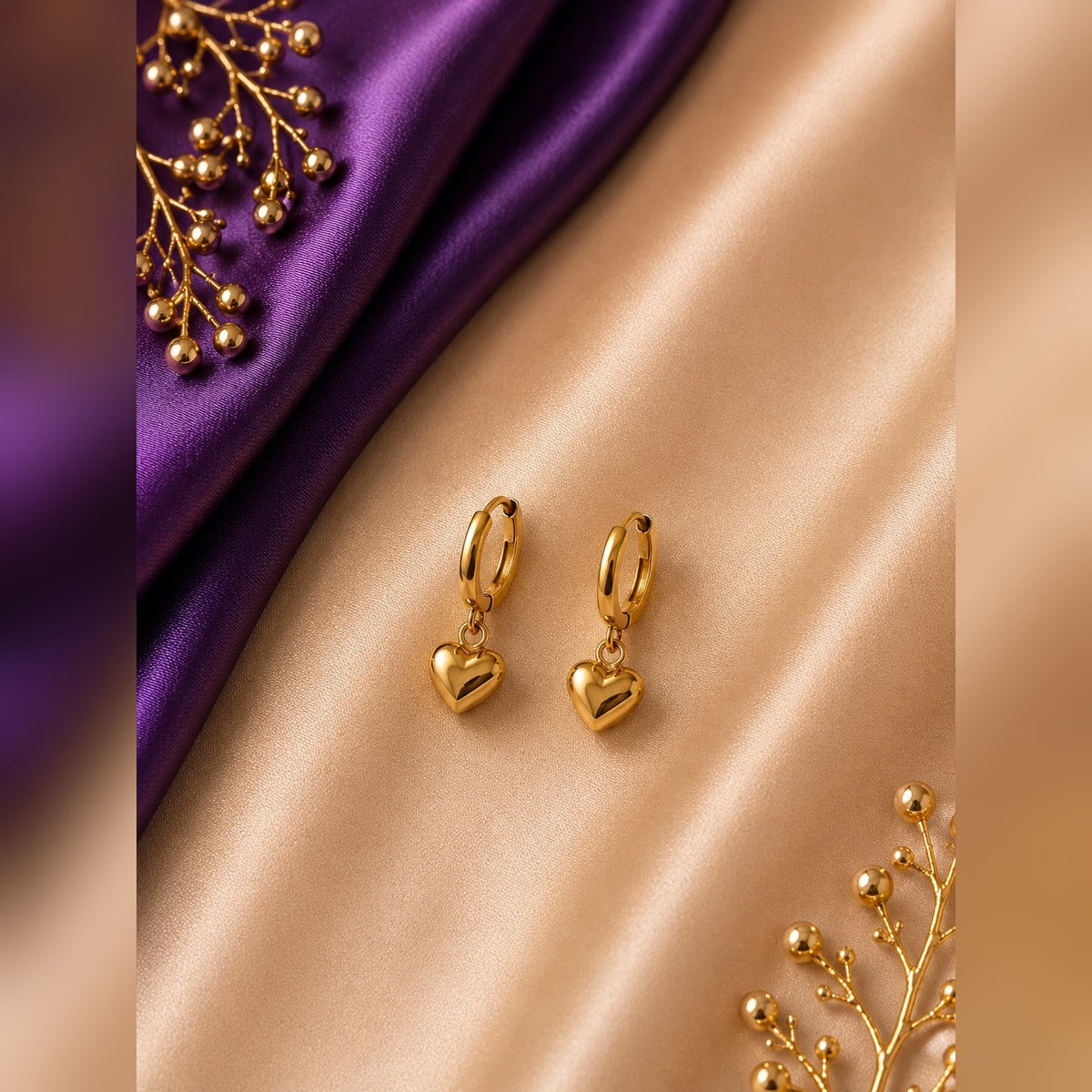 Gold hoop earrings with puffy gold heart drops, anti-tarnish