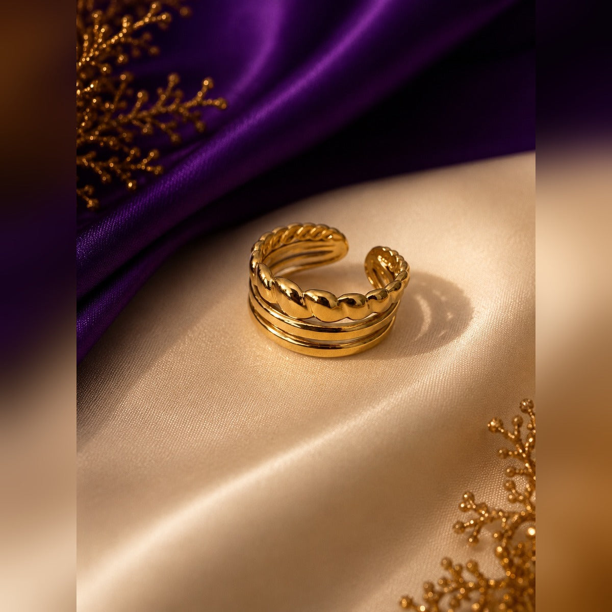 Gold twisted-rope open cuff ring with smooth bands