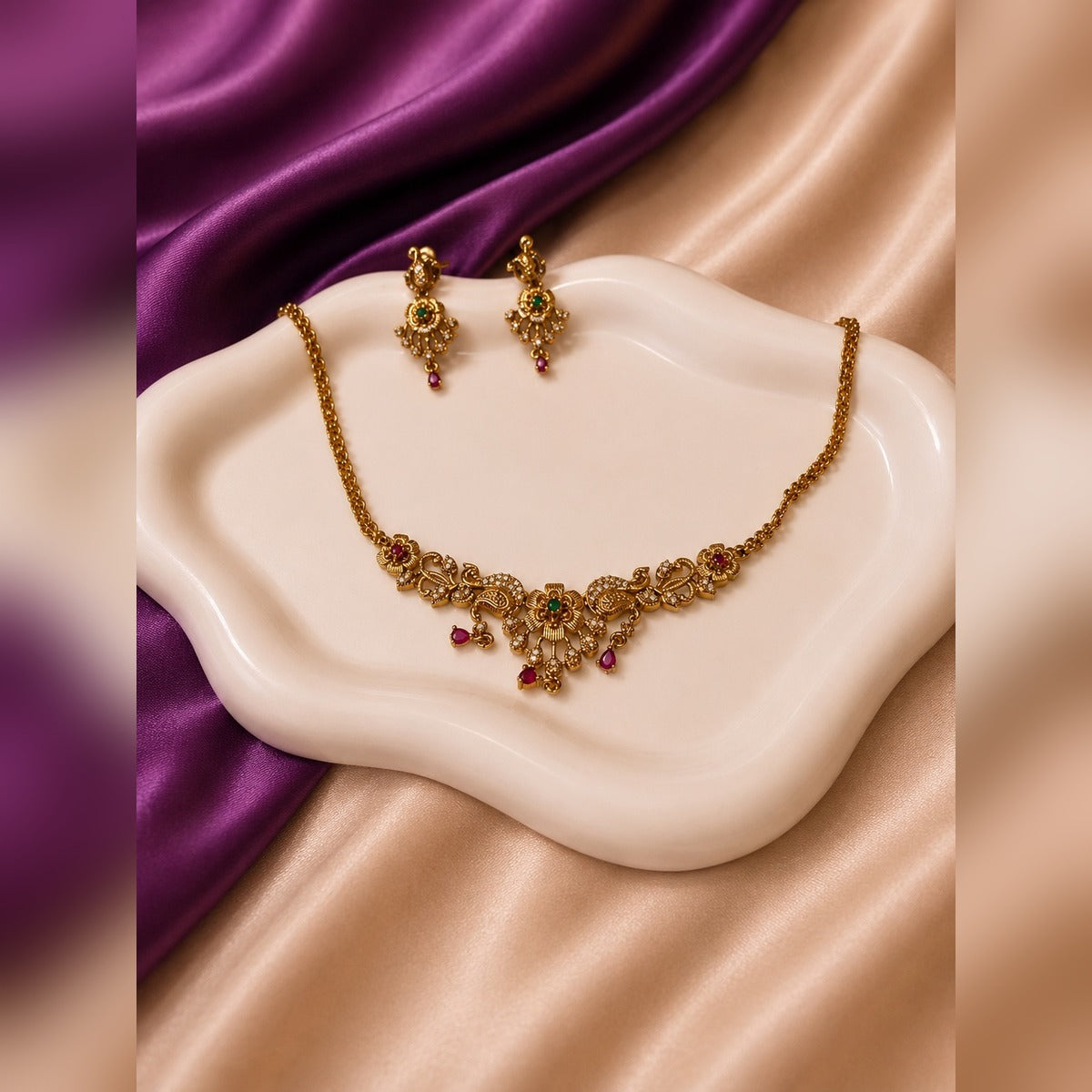 Gold-tone antique filigree necklace and earring set with ruby drops