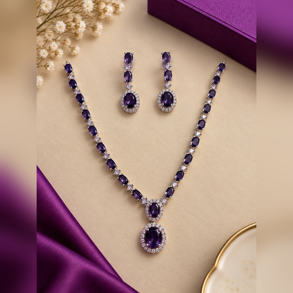 Silver-tone necklace and earring set with purple oval stones