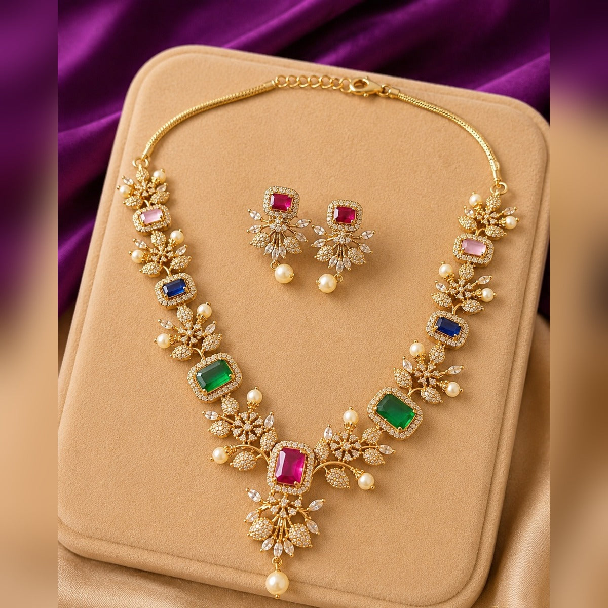 Gold necklace and earring set with multicolour rectangular stones, crystal flowers and pearls