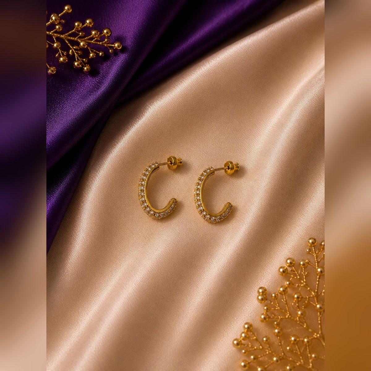 Gold pavé C-shaped hoop stud earrings