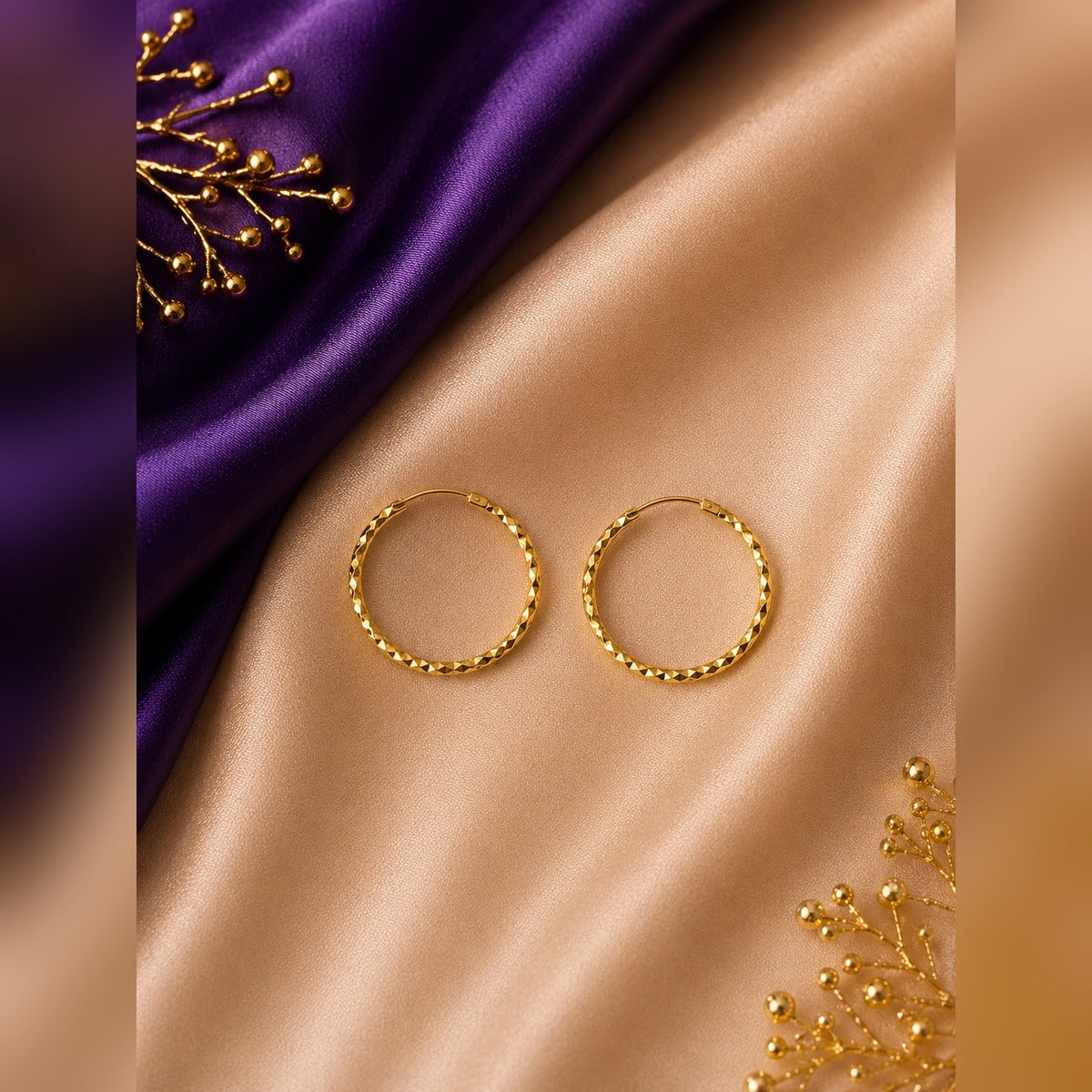 Gold thin faceted hoop earrings
