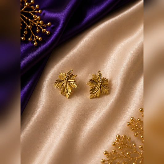 Gold leaf stud earrings with a crystal centre line