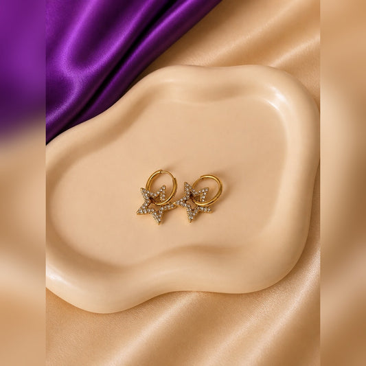 Gold hoop earrings with pavé crystal star drops, anti-tarnish