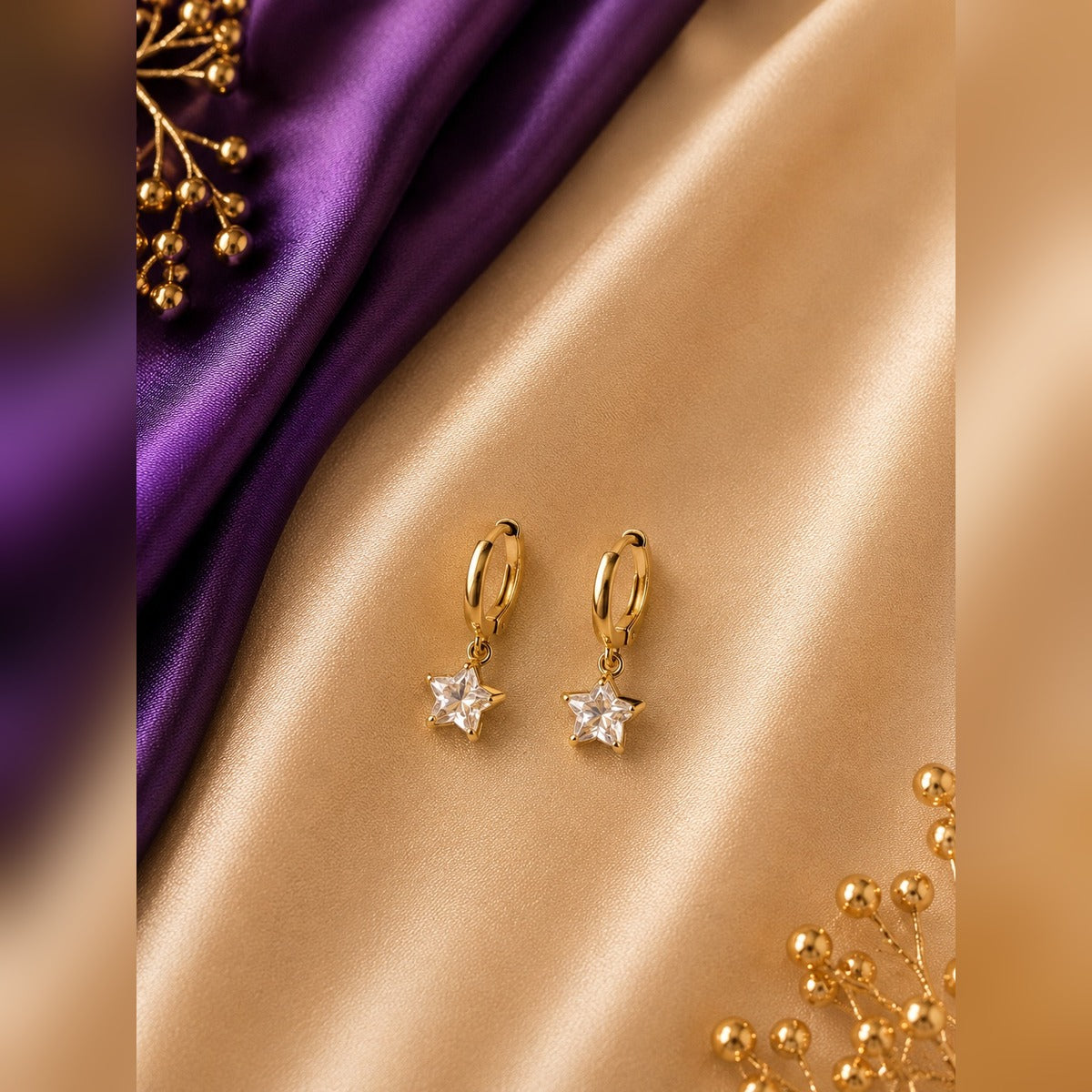 Gold hoop earrings with a plain crystal star drop, anti-tarnish