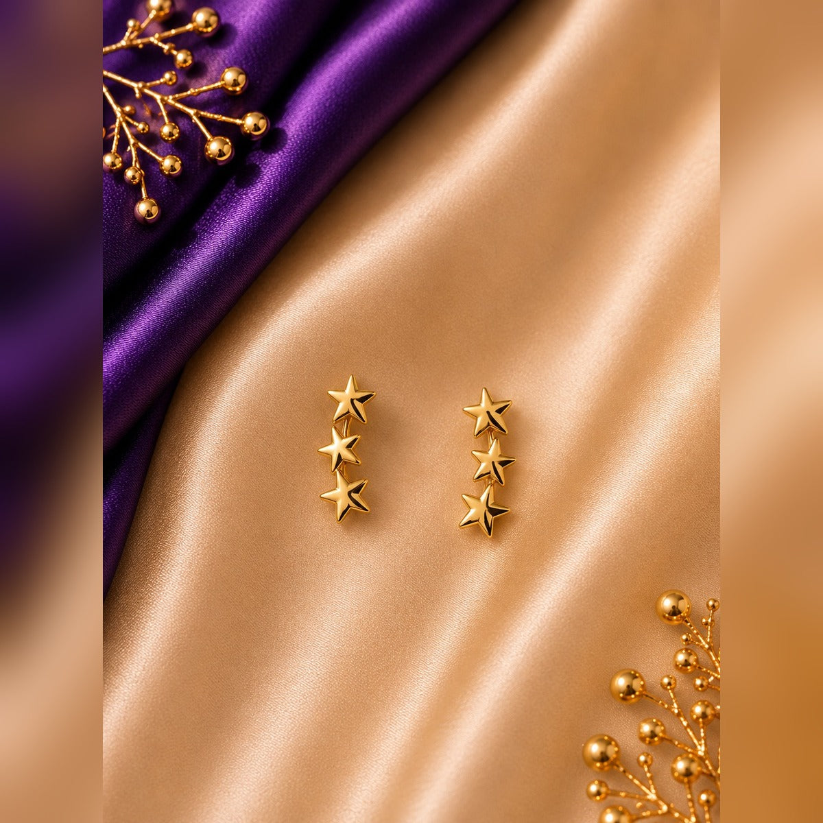 Gold vertical drop stud earrings with three gold stars in a row, anti-tarnish