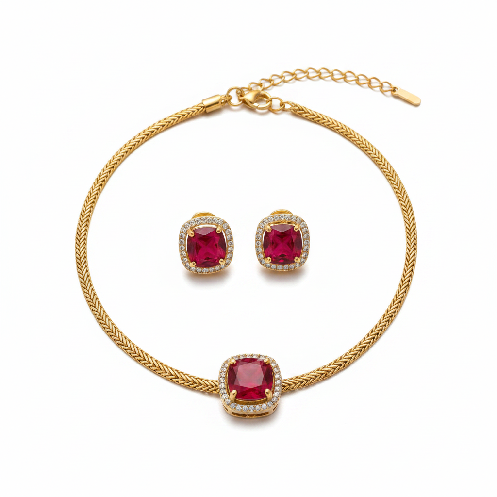 Gold cushion ruby halo solitaire necklace and earring set on white background