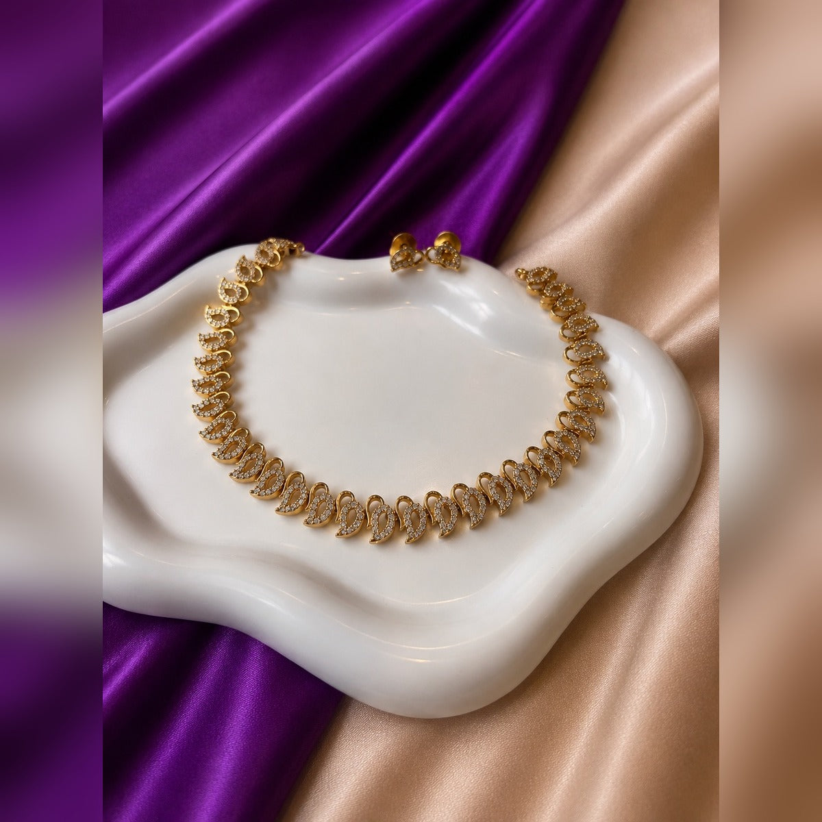Crystal leaf-link chain necklace with crystal leaf stud earrings