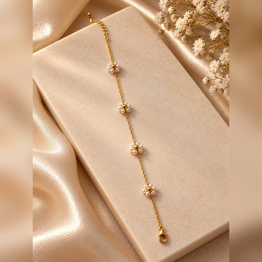 Gold chain bracelet with pearl flower clusters