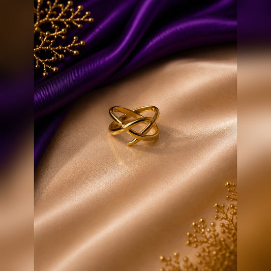 Gold open ring with smooth polished bands crossing in an X