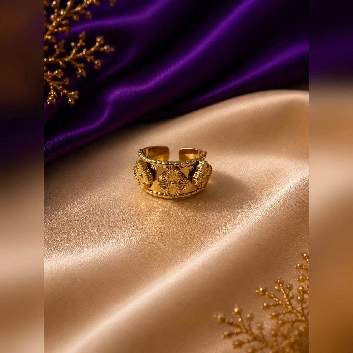 Gold wide open band ring with embossed flower motifs and beaded edges