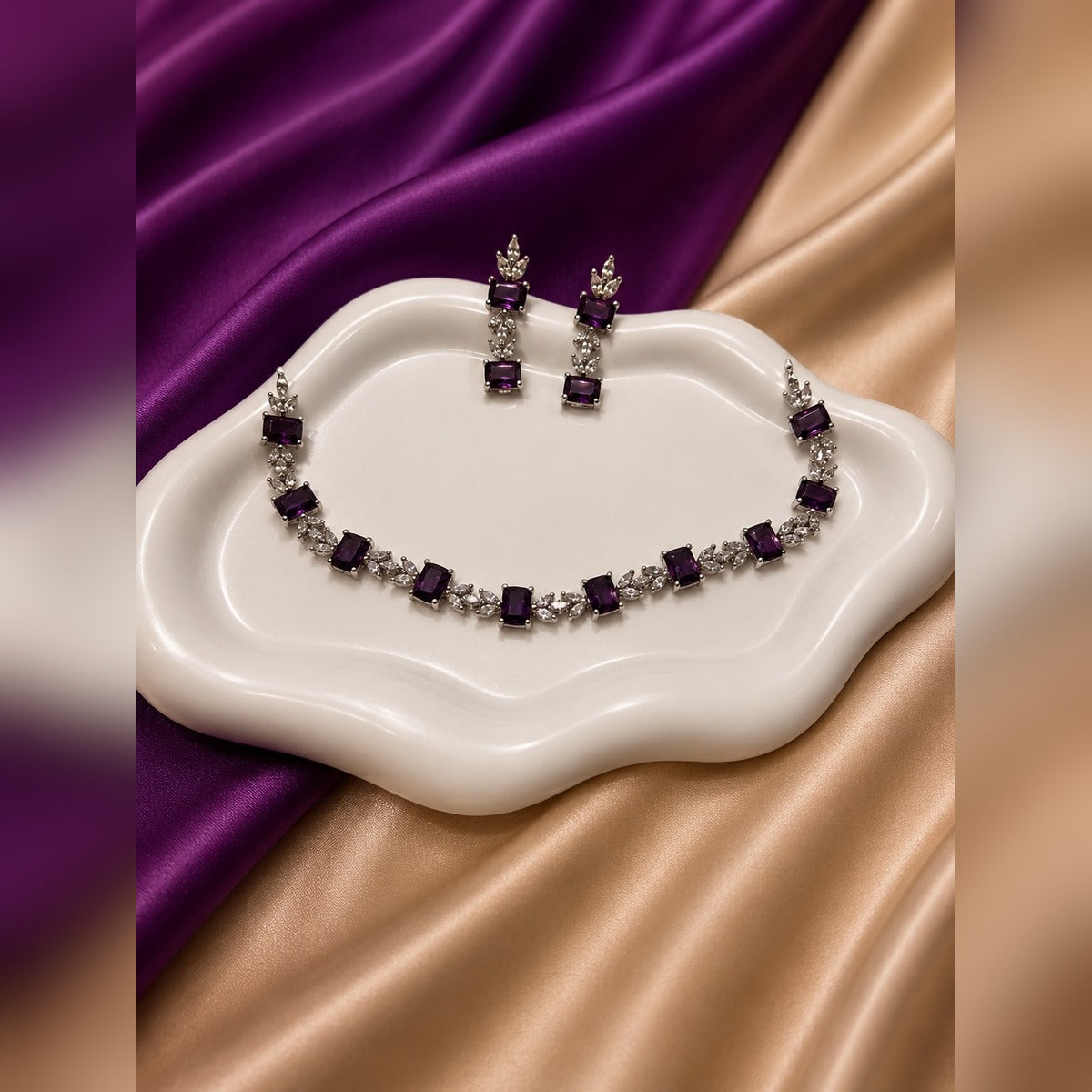 Silver-tone necklace with deep-purple rectangular stones and crystal marquise clusters