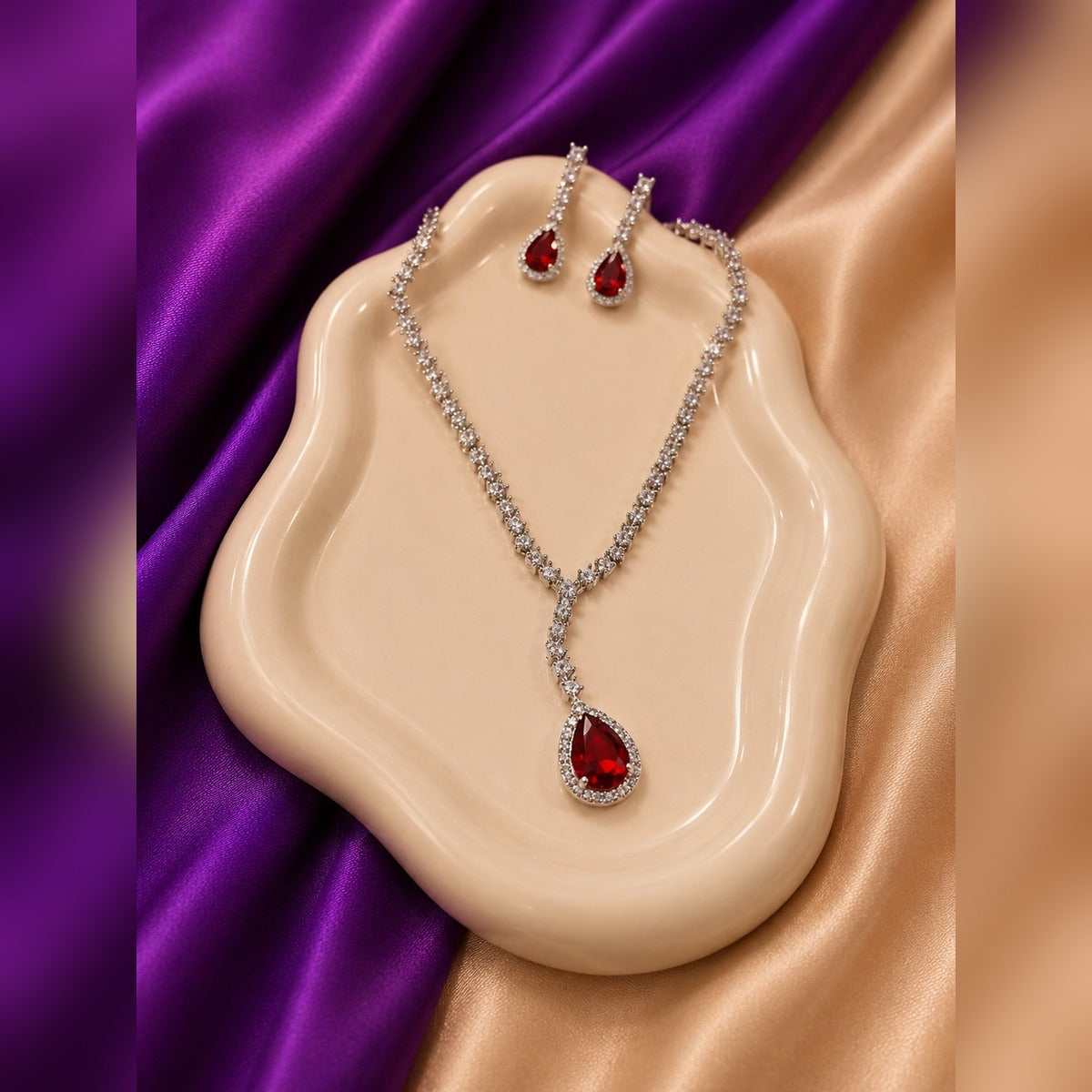 Silver-tone crystal tennis Y-necklace with ruby teardrop pendant and matching earrings